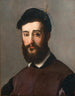 Ritratto di un giovane uomo barbuto con un cappello nero - Niccolò dell'Abate — vista dell’opera