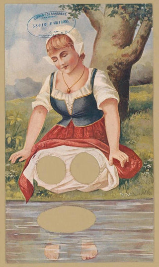 Parisian Puzzle Co - Woman kneeling at waterside.webp