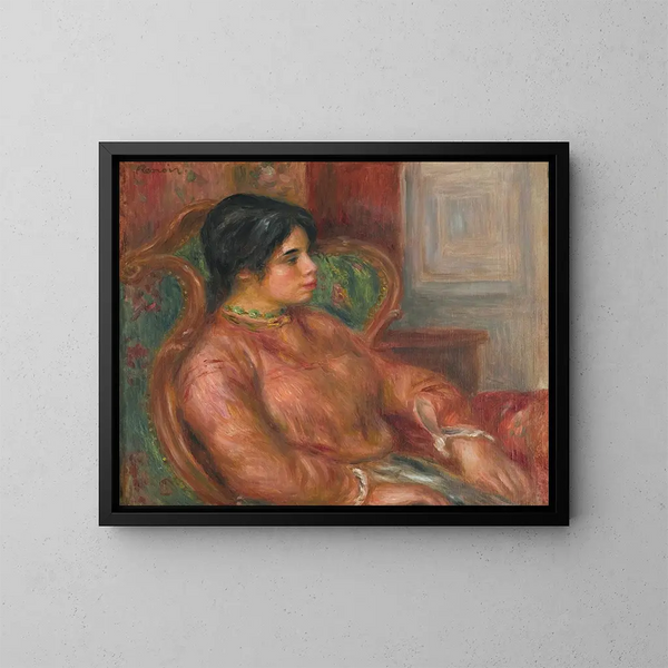 Donna sulla poltrona verde - Pierre-Auguste Renoir — quadro incorniciato alla parete