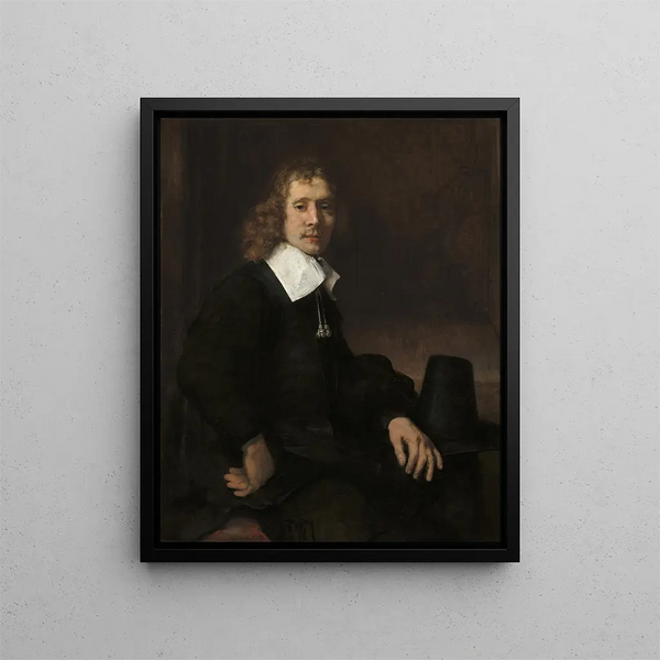 Rembrandt van Rijn - A Young Man Seated at a Table possibly Govaert Flinck.webp
