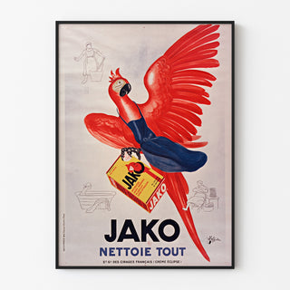 Manifesto pubblicitario vintage Jako pulisce tutto, presentato in una cornice sottile su una parete chiara.