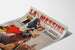 Manifesto pubblicitario vintage La Messine, liquore, presentato su una pagina incurvata, vista prospettica.
