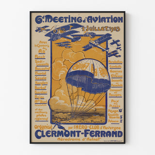 Manifesto d’epoca Meeting d’aviation, Clermont-Ferrand, presentato in una cornice sottile su una parete chiara.