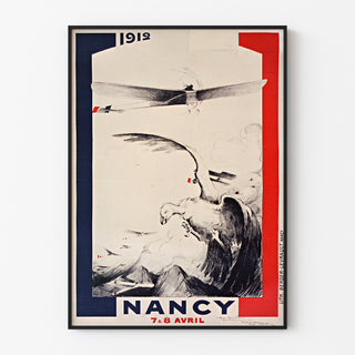 Manifesto vintage Nancy, meeting d’aviation, esposto in una cornice sottile su una parete chiara.