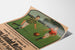 Manifesto vintage Sarreguemines, partita di calcio, presentato su una pagina curva, vista in prospettiva.
