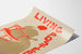 Poster vintage Living Posters con silhouette femminile e sedia rossa