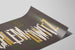 Poster di design tipografico Schlemowitz in bianco e oro — vista dell’opera